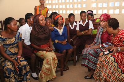 President Sirleaf interacts with students.